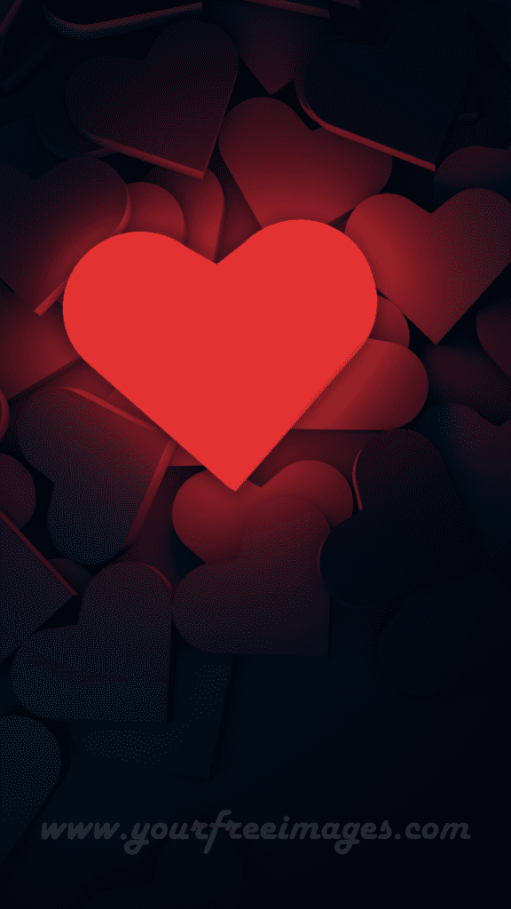 A glowing Red heart in the dark with a light wallpaper