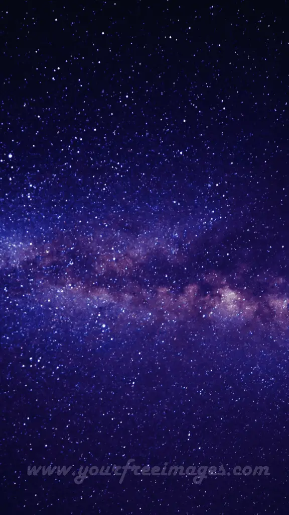 Mesmerizing galaxy-themed wallpaper, featuring a stunning starry night sky