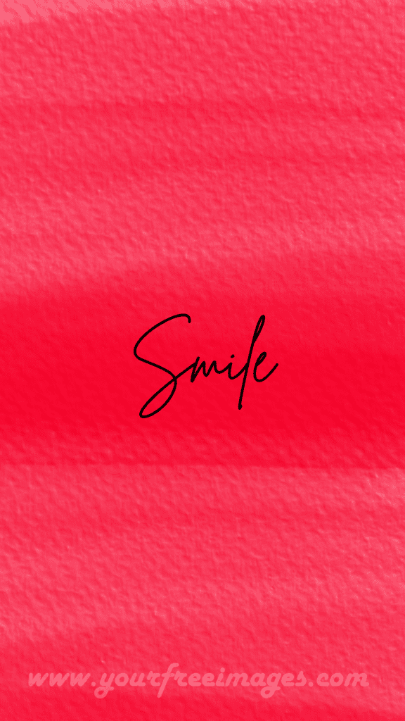 Red smiley face emoticon on a black background